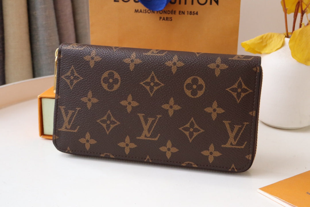 VIVIENNE ZIPPY WALLET 9.5 MONOGRAM CANVAS