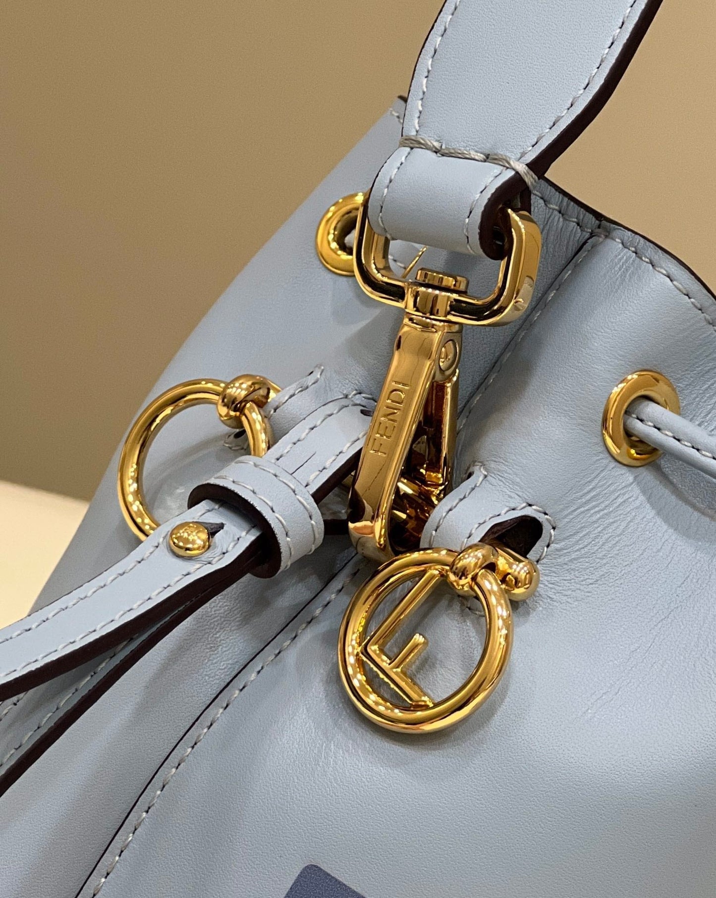 MON TRESOR MINI 18 BAG IN LIGHT BLUE CALFSKIN FF WITH GOLD HARDWARE