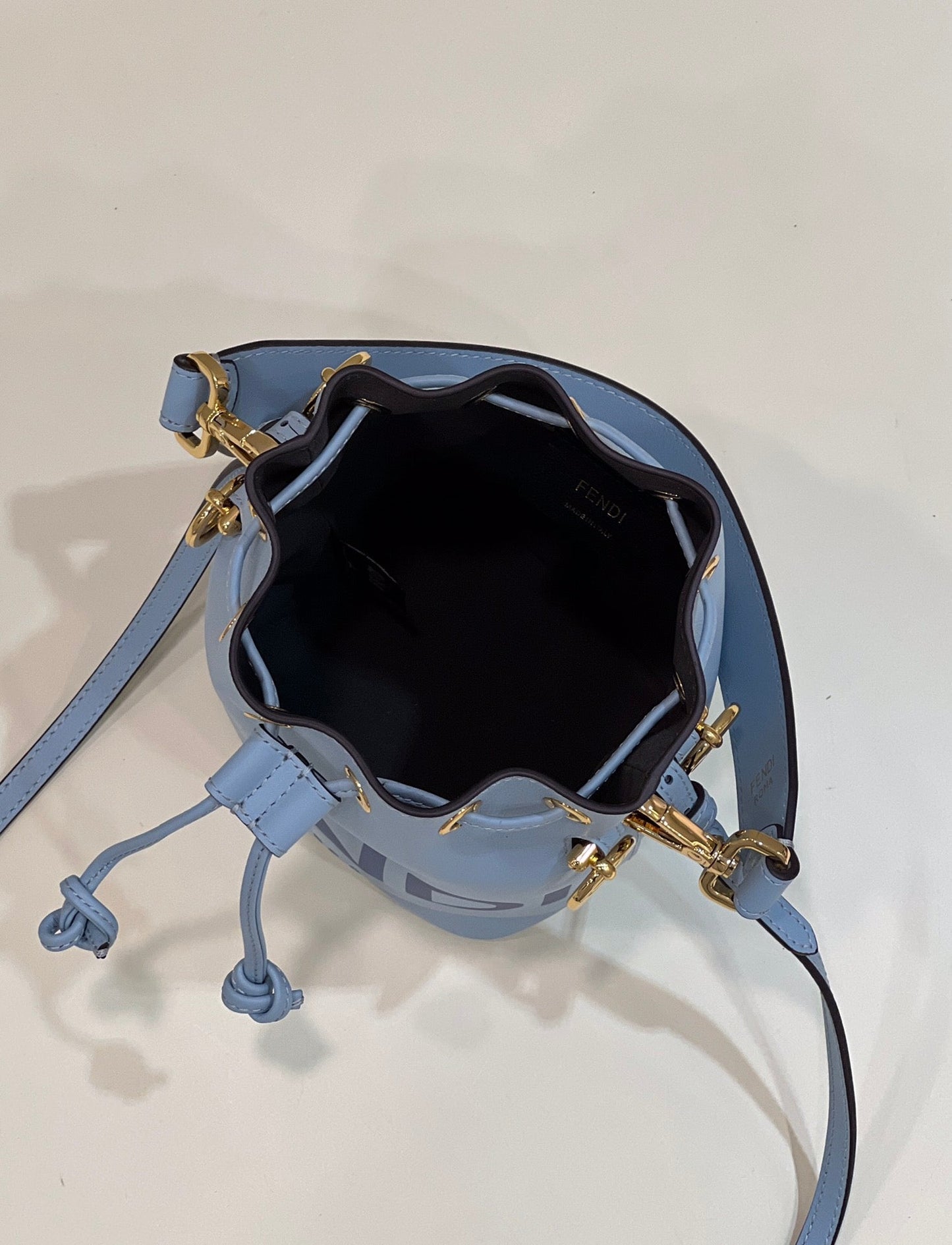 MON TRESOR MINI 18 BAG IN LIGHT BLUE CALFSKIN FF WITH GOLD HARDWARE