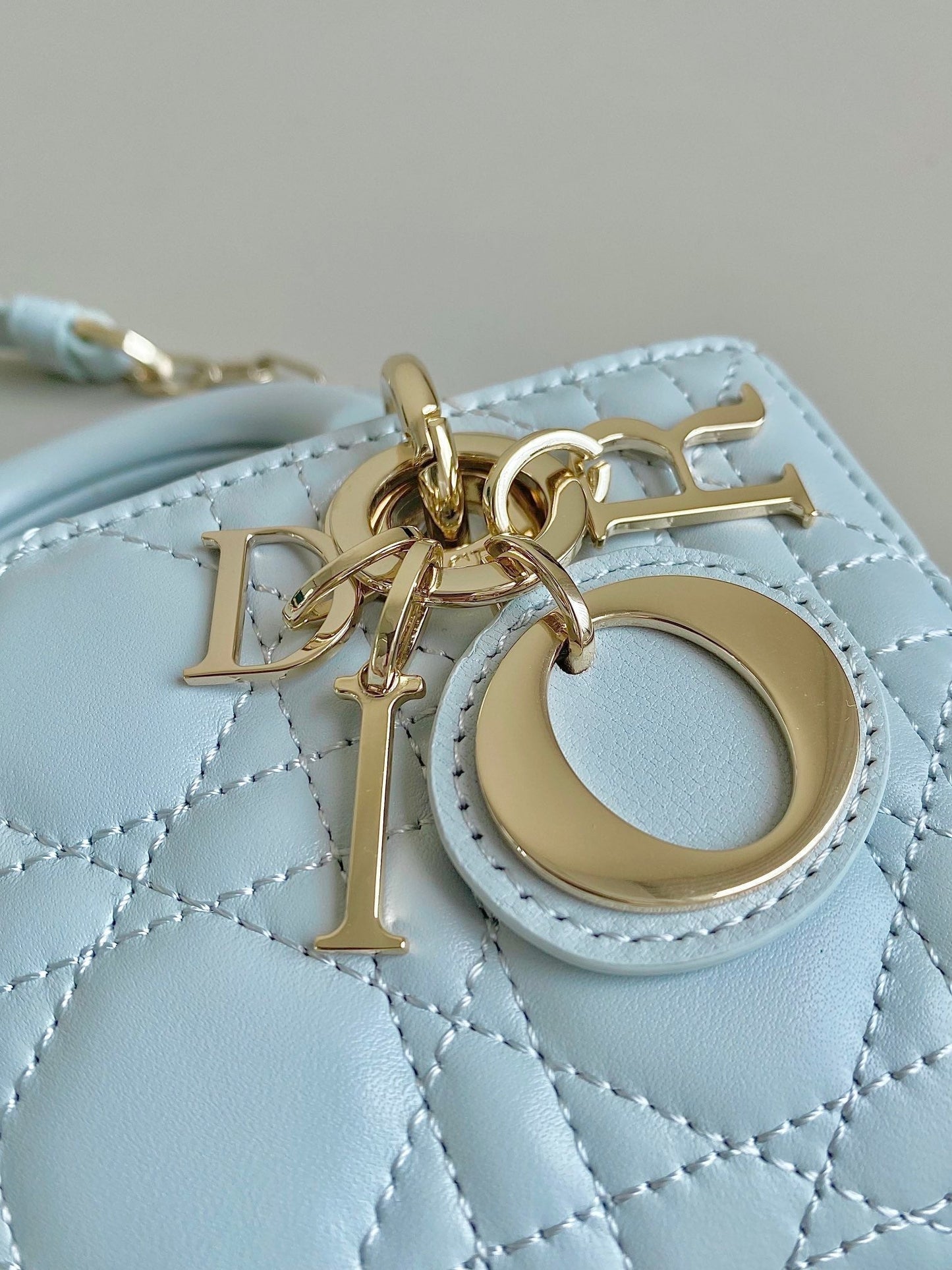 MINI D-JOY BAG 17 IN LIGHT BLUE LAMBSKIN