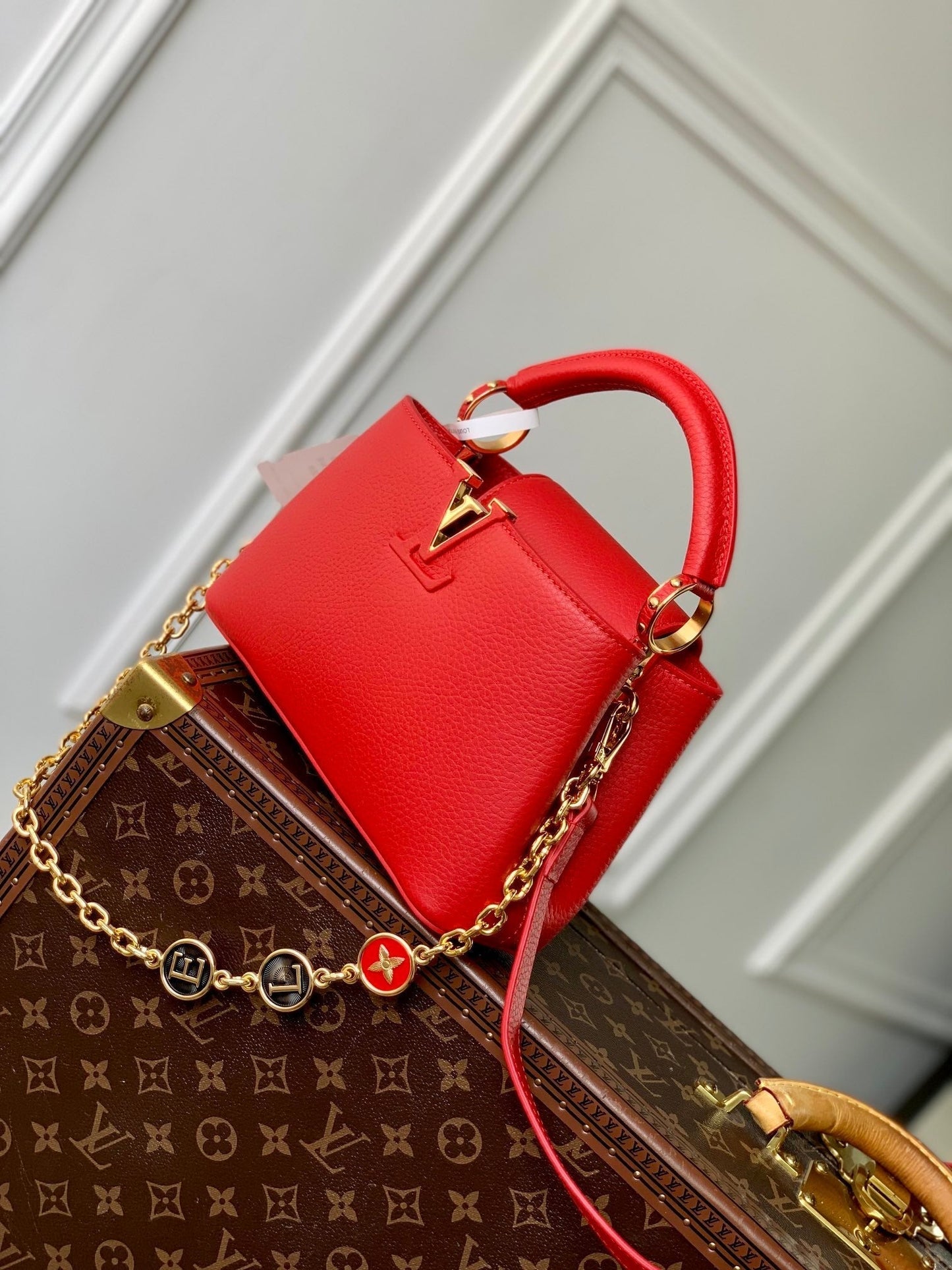 CAPUCINES MINI 23 IN RED TAURILLON GOLD HARDWARE