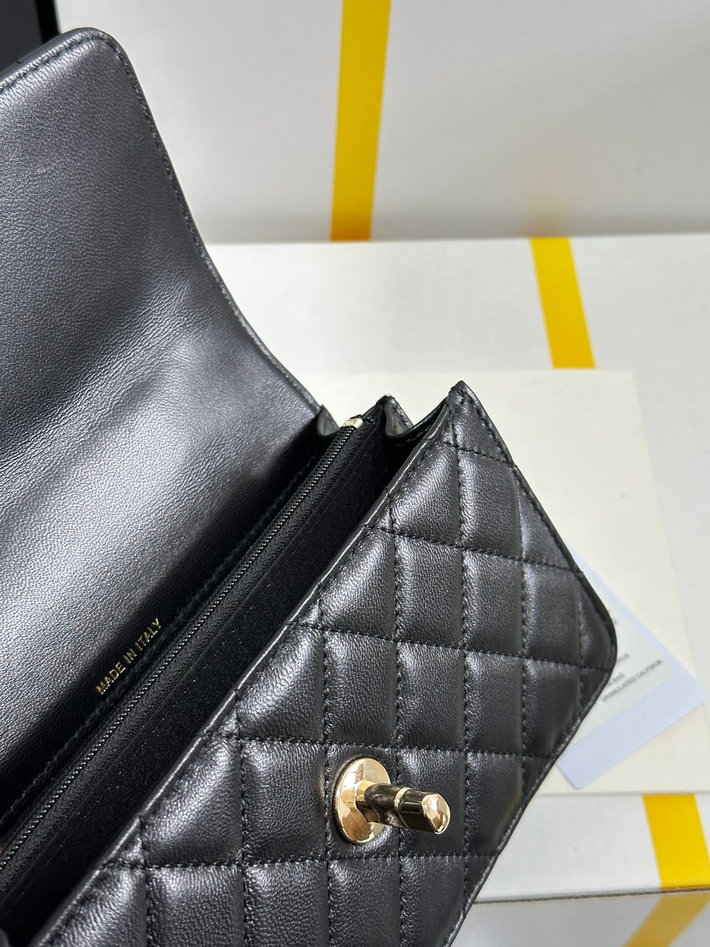 FLAP BAG 18 WITH HANDLE IN BLACK CALFSKIN GOLD HARDWARE